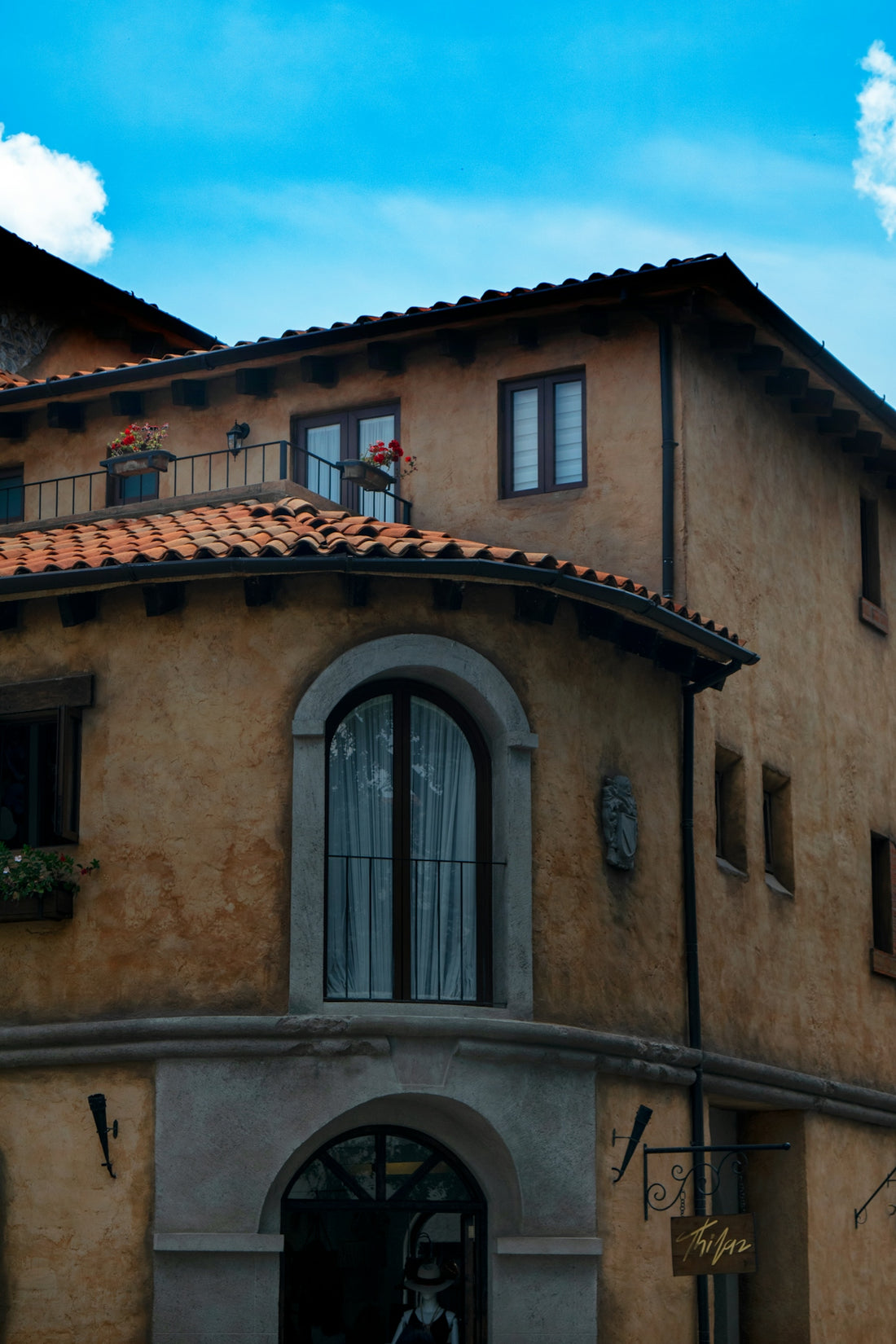 a building with windows and a balcony