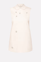Dress with N0-nà appliqués